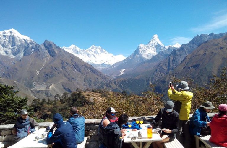 Tourists taking selfie during Everest base camp trek in the Himalayas